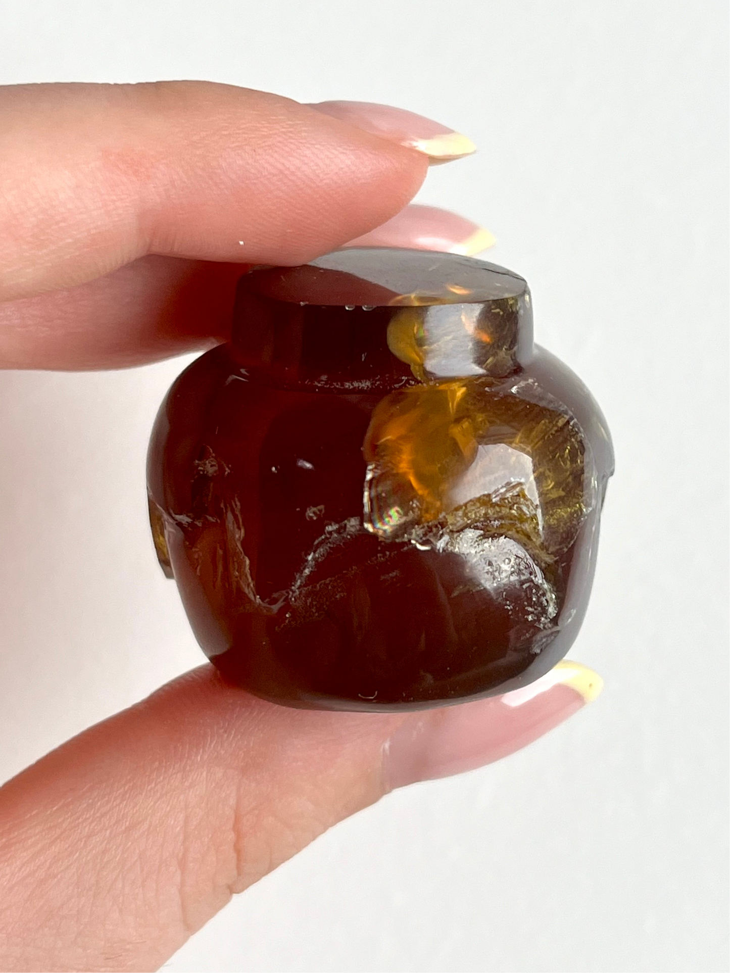 Vasetto di miele in ambra