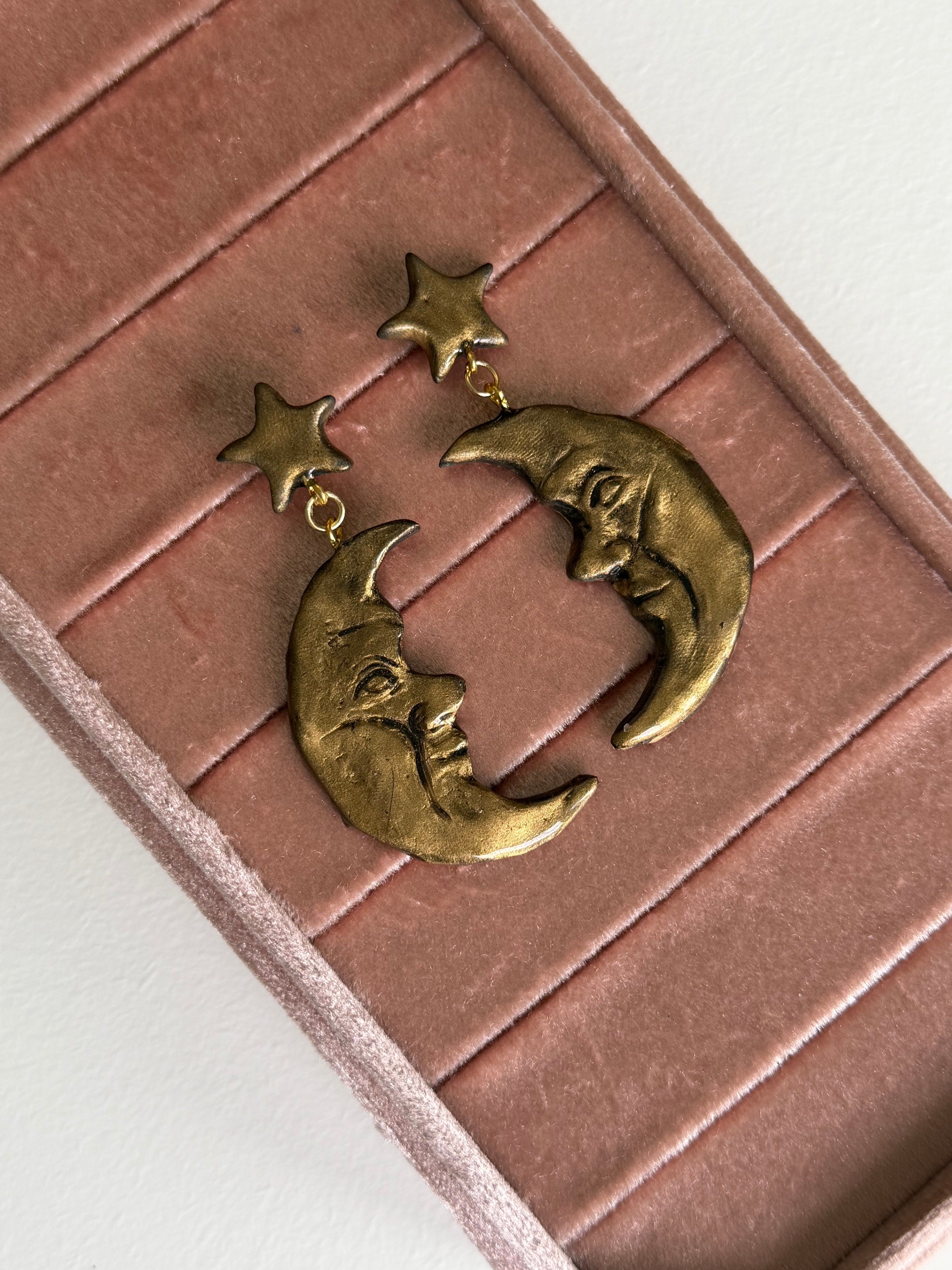 Orecchini stella e luna con volta