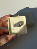 Anello a fascia in moissanite