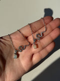 Collana con serpente in opale etiope