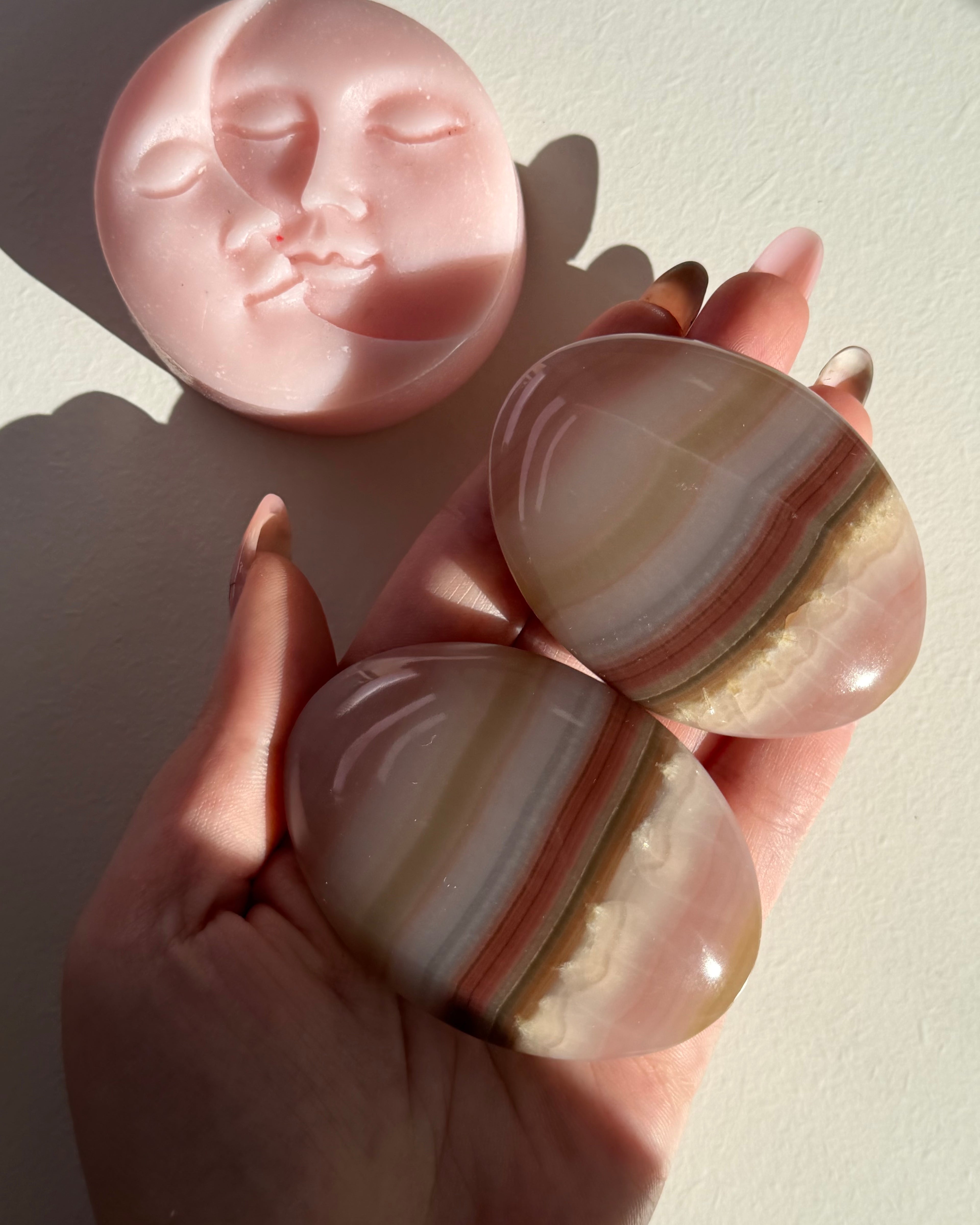 Palmstone in calcite rosa a bande