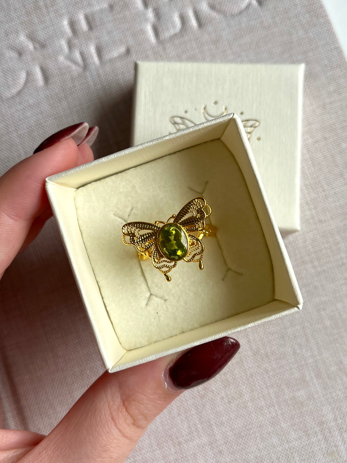 Anello farfalla in peridoto