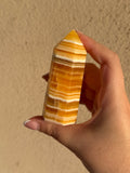 Torre in calcite arancione