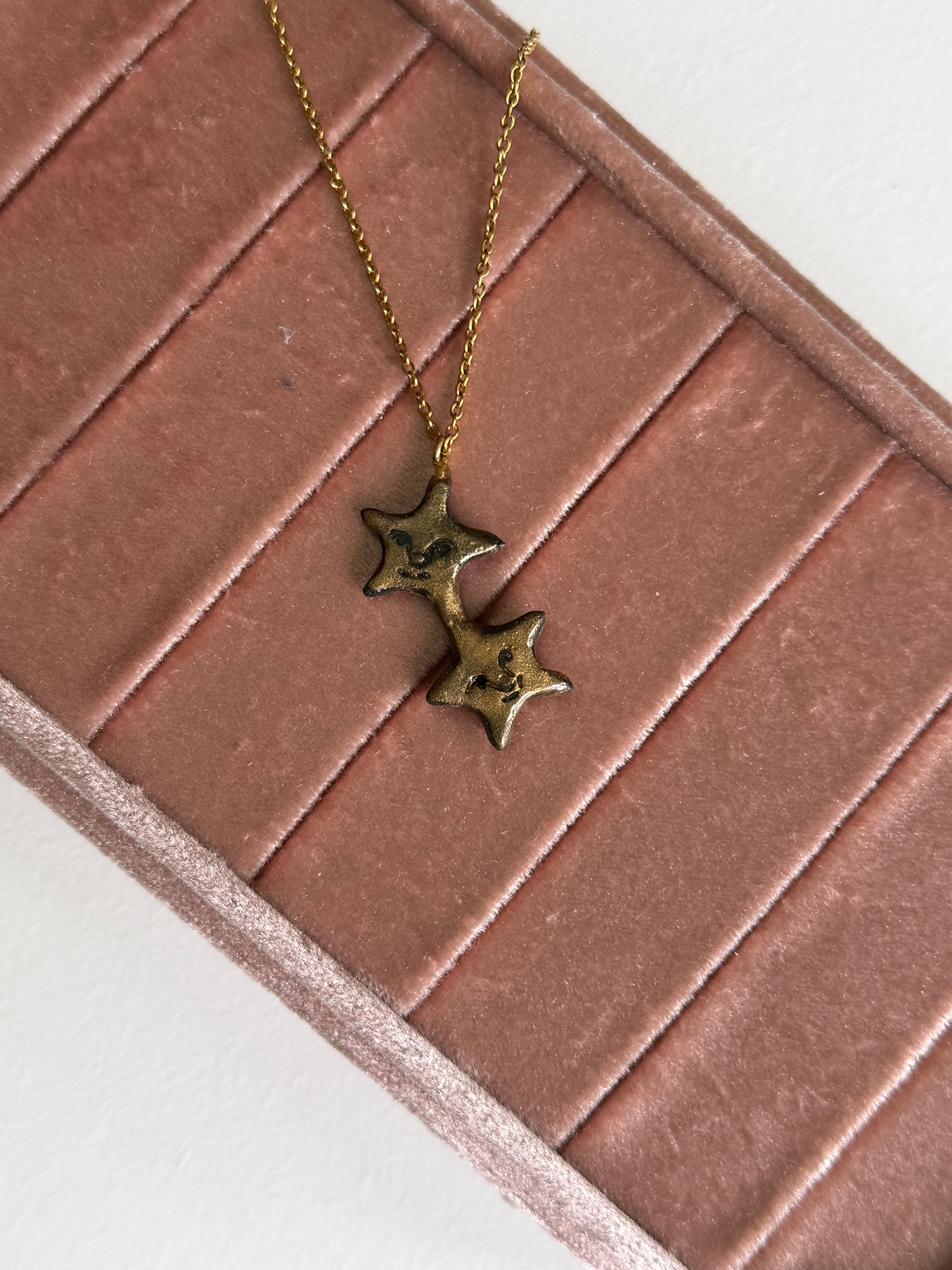 Collana stelline con volto
